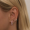 Pluto huggie earrings