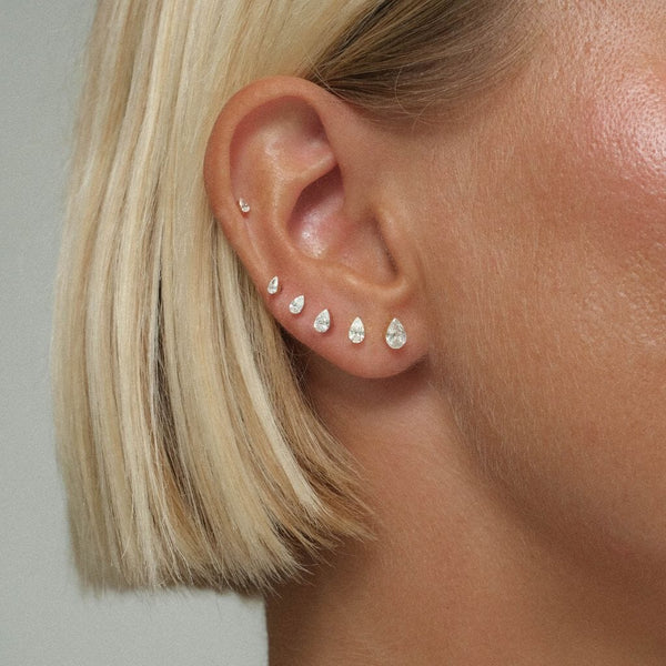 Hugh pear diamond piercing