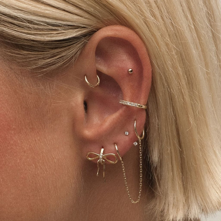 Mike diamond hoop piercing