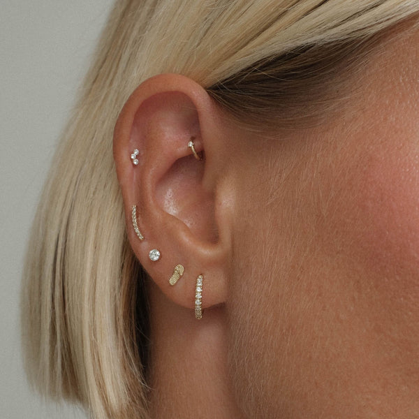 Slater flip flop piercing