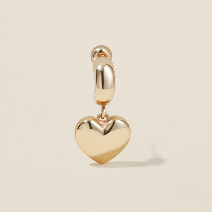 Bug heart charm piercing