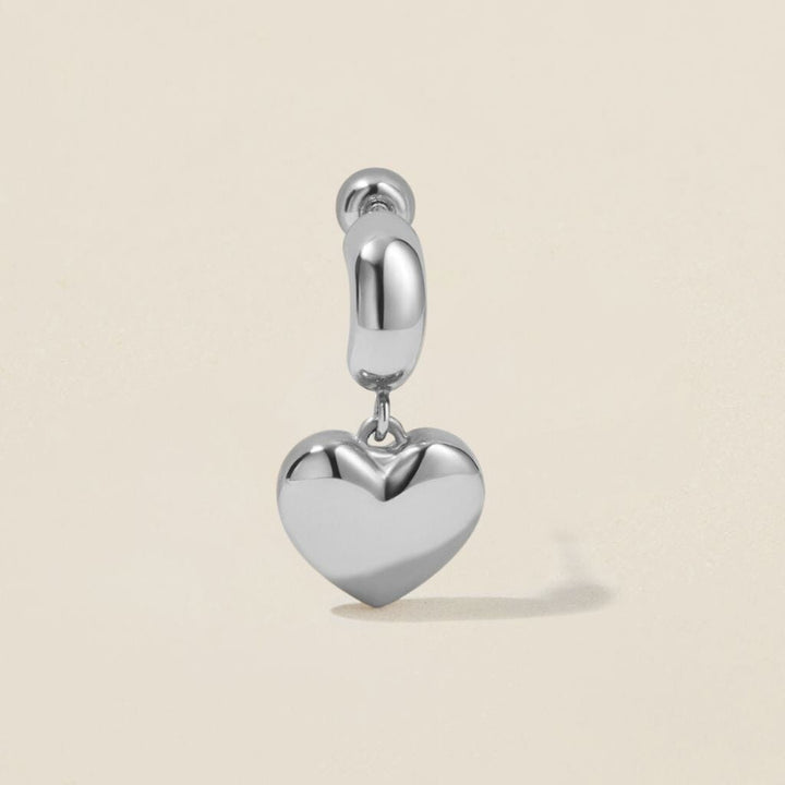 Bug heart charm piercing