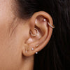 Andre racquet piercing