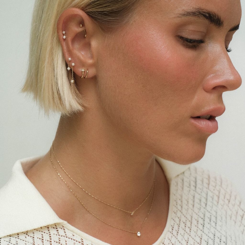 August drop pearl piercing