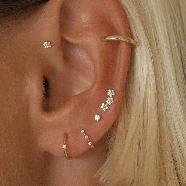 Brody triple micro flower piercing