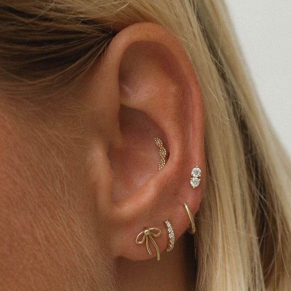 Duke twinset diamond piercing