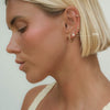 Ellis pear diamond piercing