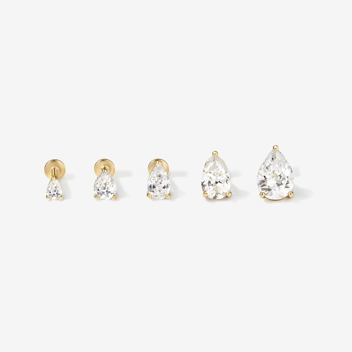 Ellis pear diamond piercing