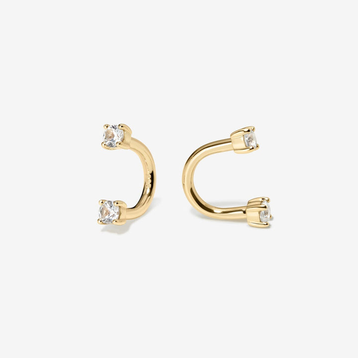 Pair of Frankie gold U hoop earrings with lab diamonds at both ends.