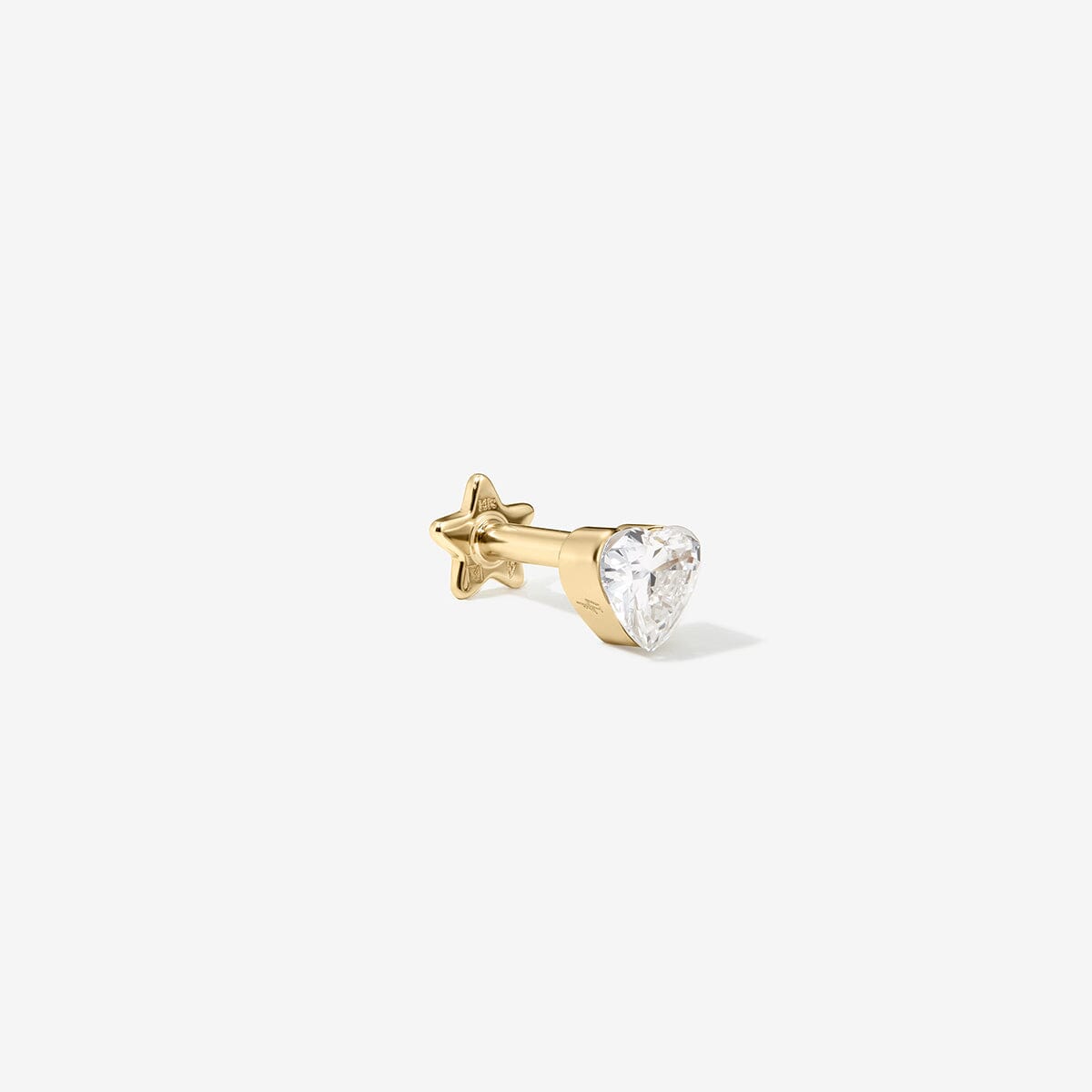 Gold stud with a heart-shaped lab-grown diamond, shown from the side.