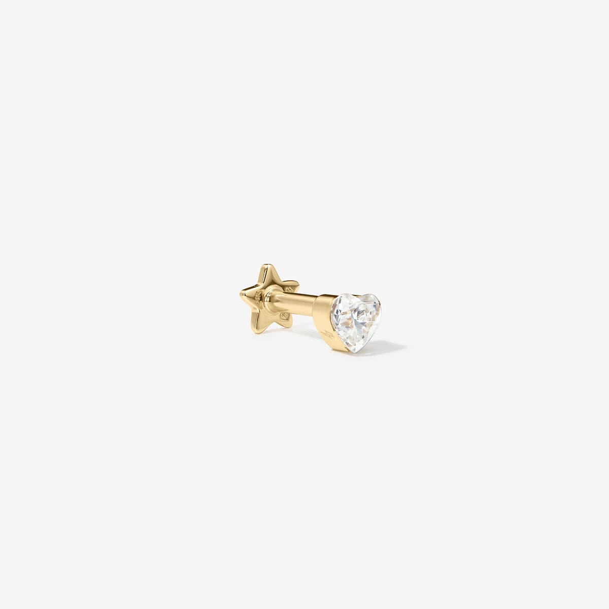 Gold heart-shaped lab-grown diamond stud shown from the side.