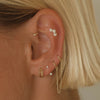 Jarrett triple micro flower piercing