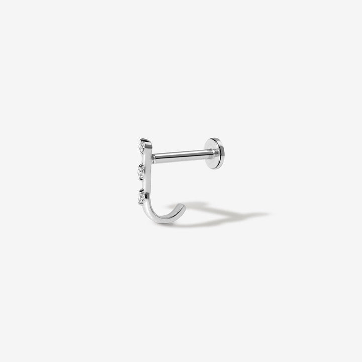Lane diamond J piercing