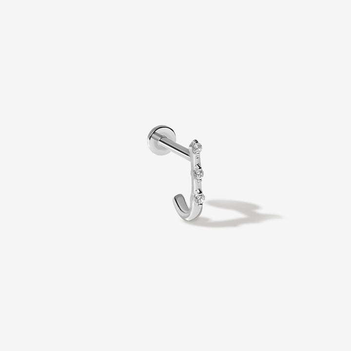 Lane diamond J piercing