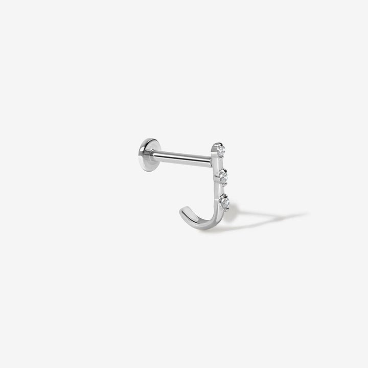 Lane diamond J piercing
