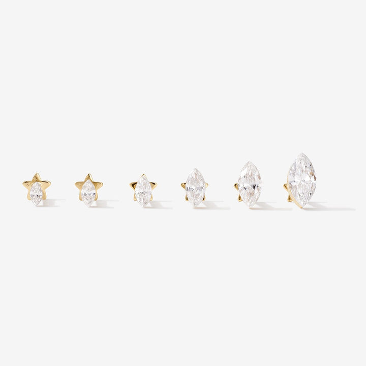 Six gold marquise-shaped lab-grown diamond studs in graduated sizes.