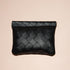 Large black woven clutch