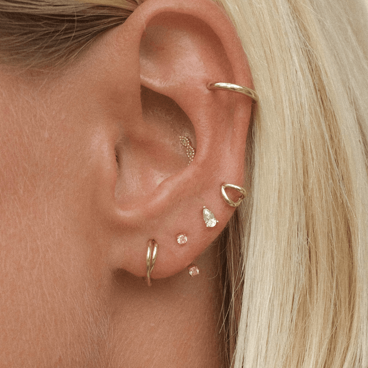 Frankie pink diamond u hoop piercing