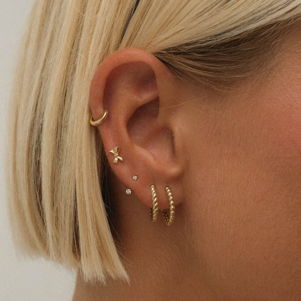 Rollins bow piercing