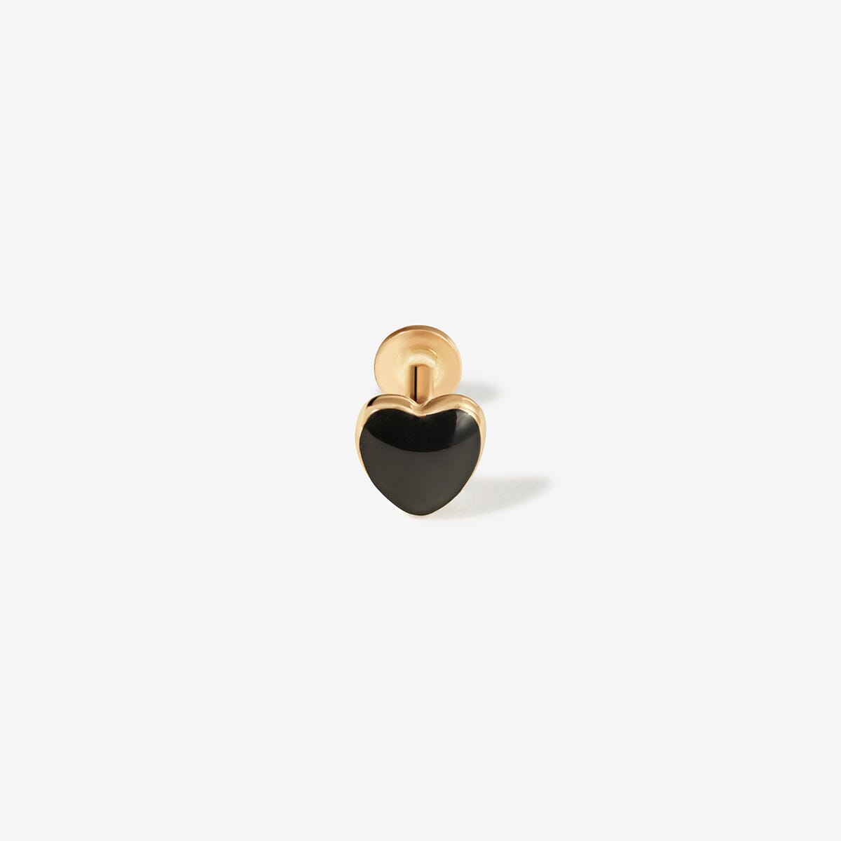 Gold heart stud with black enamel.