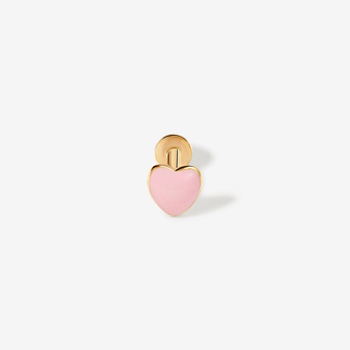 Gold heart stud with pink enamel.