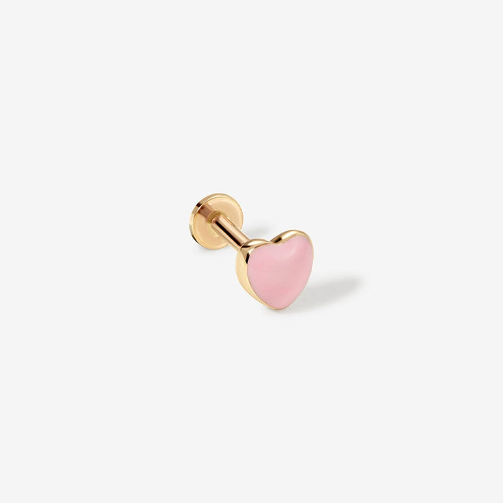 Saint gold flat-back stud with a pink enamel heart.