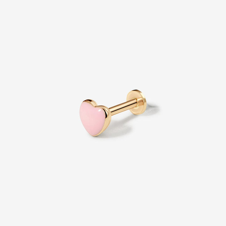 Saint gold flat back stud with a pink enamel heart.
