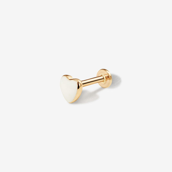 Saint white heart piercing
