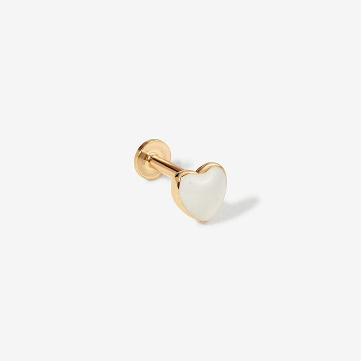 Saint white heart piercing