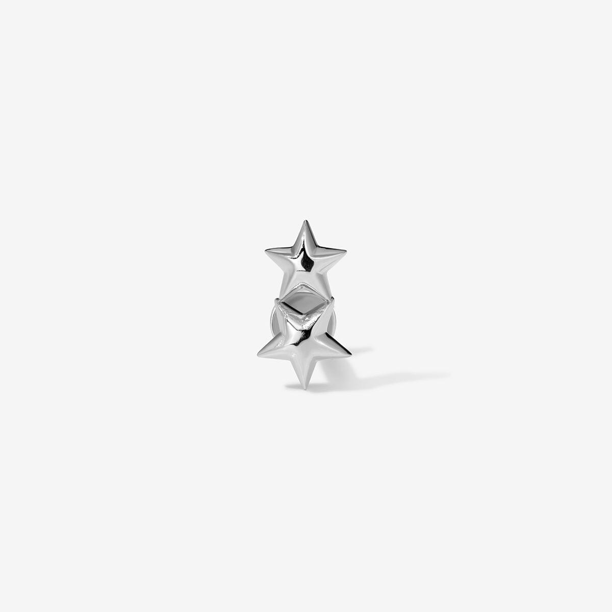 White gold stud with two stacked stars.