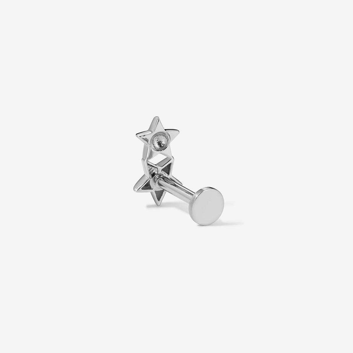 Rear view of a white gold double-star stud with a flat disc back.