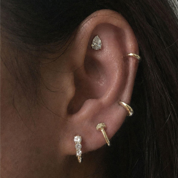 Ellis pear diamond piercing
