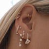 Kalel pearl huggie earrings