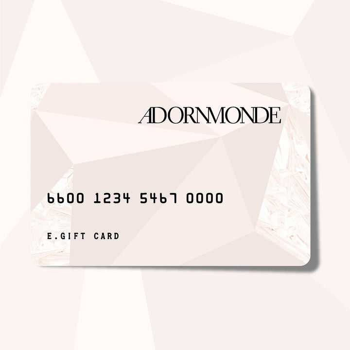 Adornmonde e-gift card on a pale pink geometric background.
