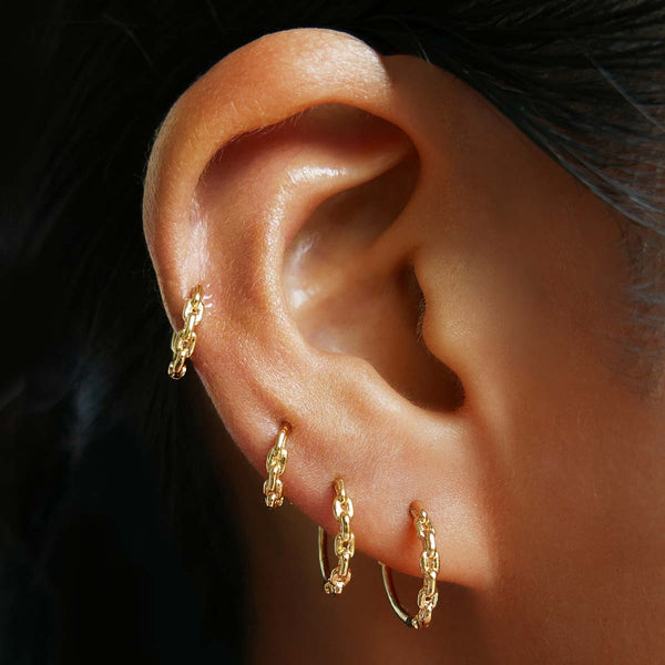 Thomas huggie earrings