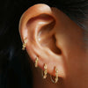 Thomas huggie earrings
