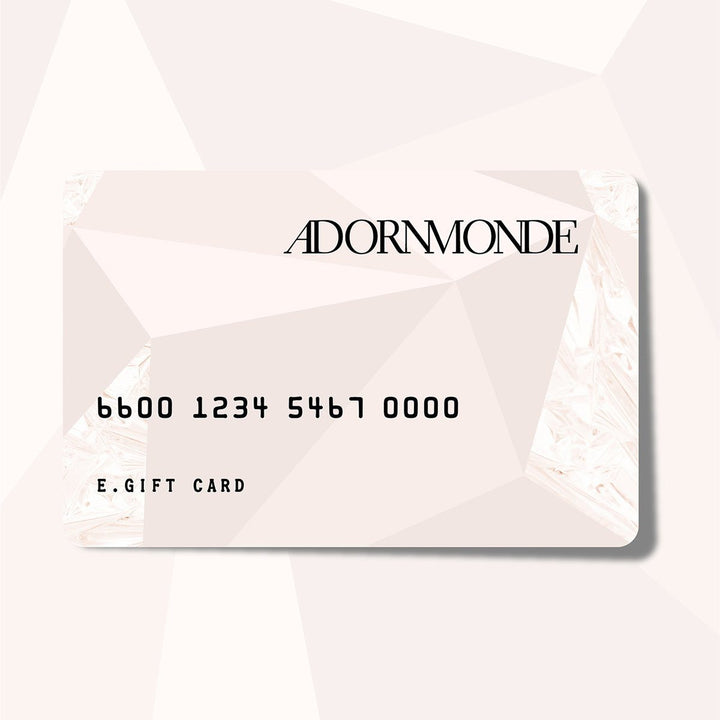 Adornmonde e-gift card on a pale pink faceted background.